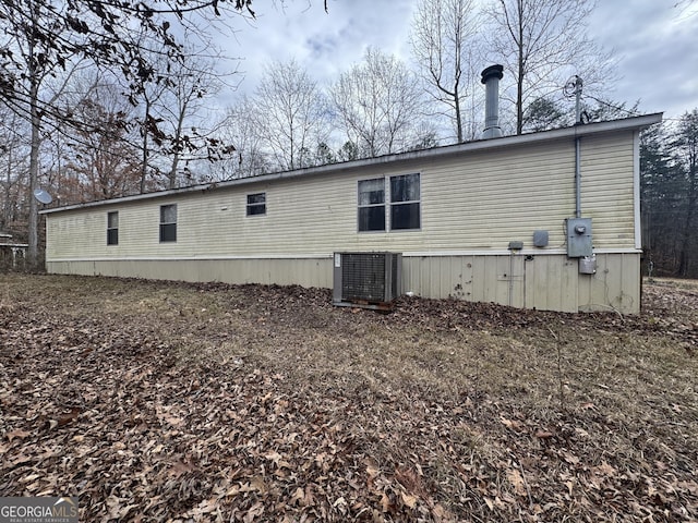 back of property with central air condition unit