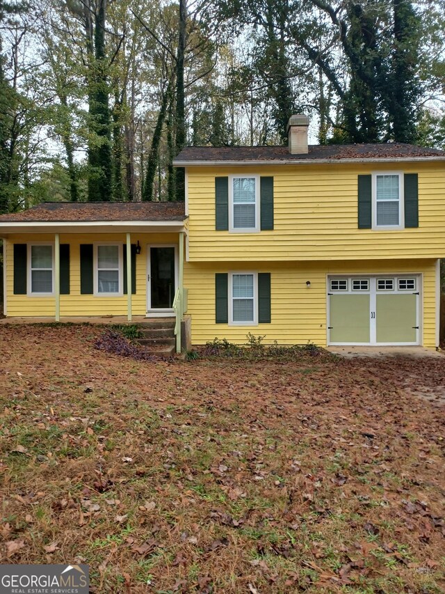 split level home with a garage