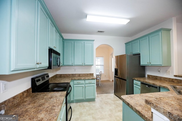 kitchen featuring black appliances and sink