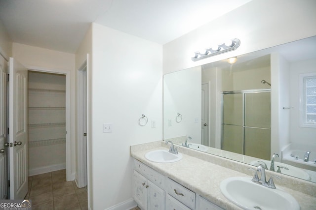 bathroom featuring vanity and separate shower and tub