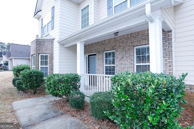 entrance to property with covered porch