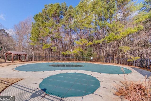 view of swimming pool with a gazebo