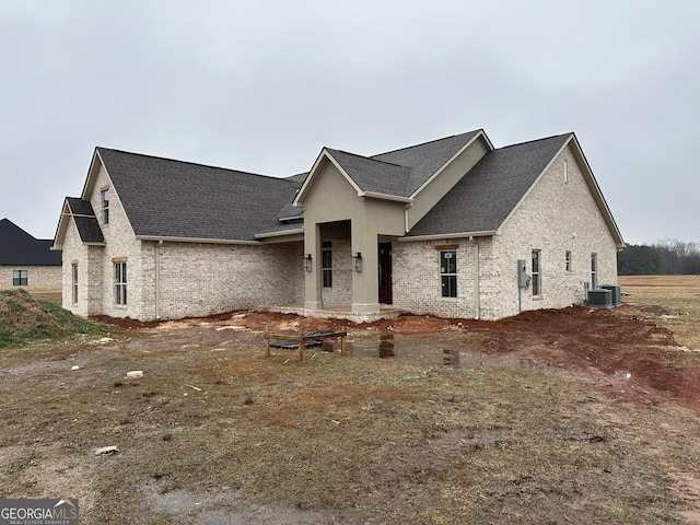 view of front of property with central AC