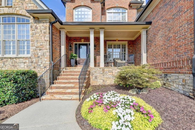 property entrance with covered porch