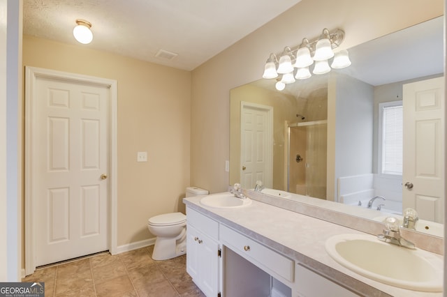 full bathroom with vanity, independent shower and bath, and toilet