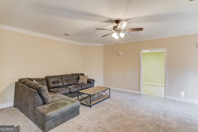 carpeted living room with ceiling fan and crown molding