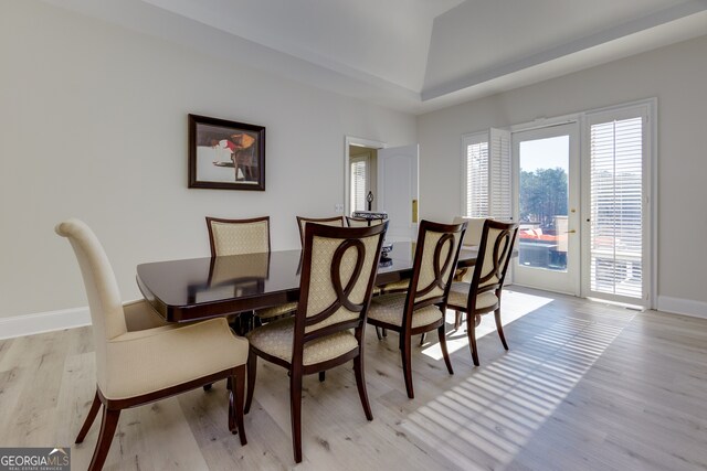 dining area with light hardwood / wood-style flooring