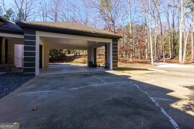 view of car parking featuring a carport