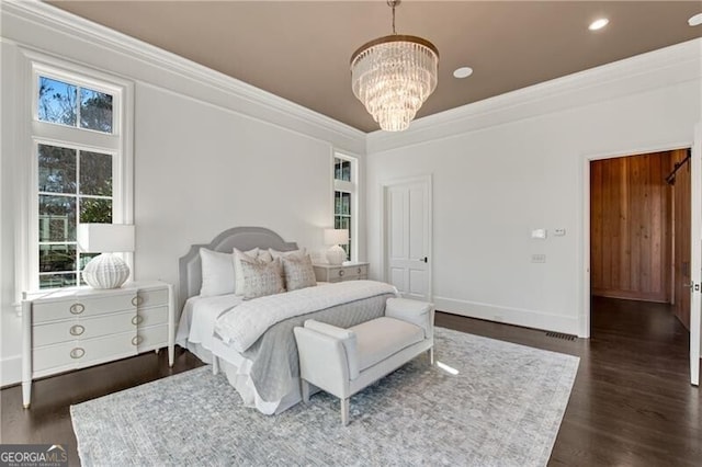 560 Lost River Bnd, Milton, GA 30004 - bedroom with crown molding, multiple windows, a chandelier, dark wood-type flooring, and recessed lighting
