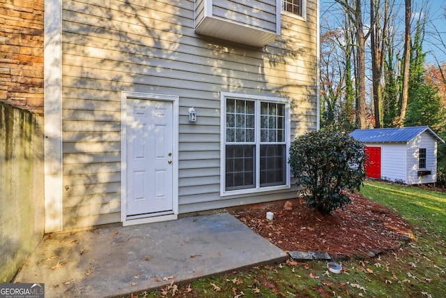 doorway to property with a patio area