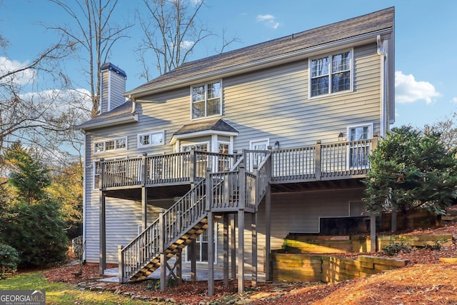 rear view of house with a deck