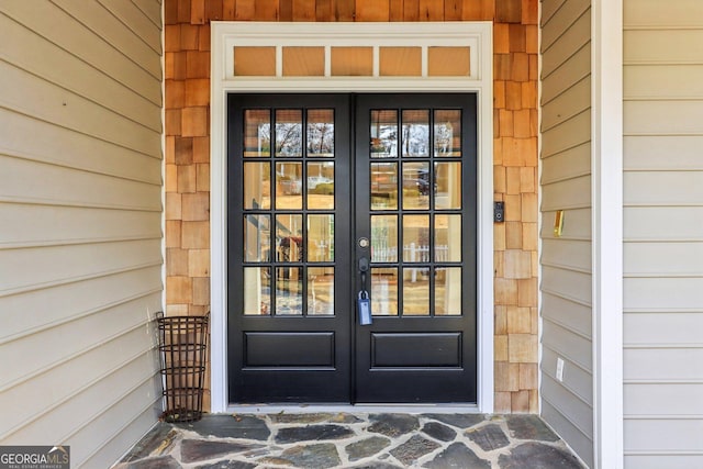 doorway to property featuring french doors