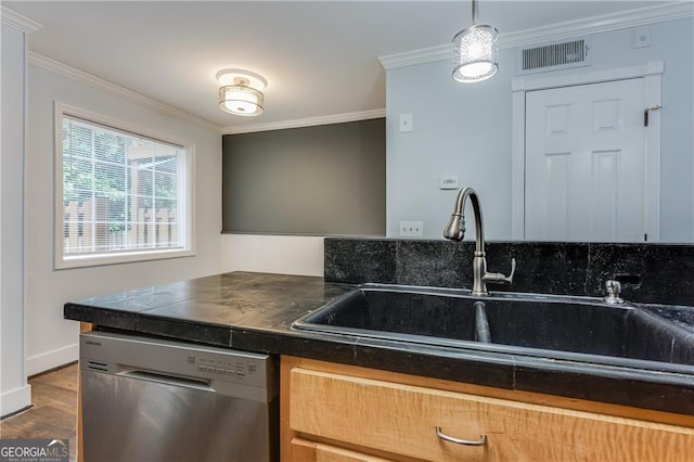 kitchen featuring decorative light fixtures, stainless steel dishwasher, sink, crown molding, and dark hardwood / wood-style flooring