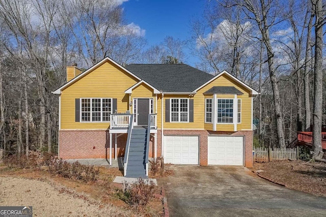 view of front of property with a garage