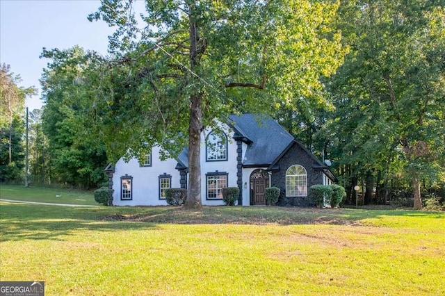 view of front of home with a front yard