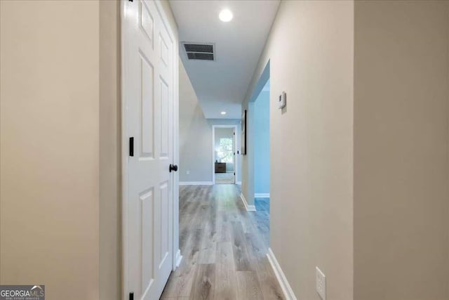 hallway featuring light wood-type flooring