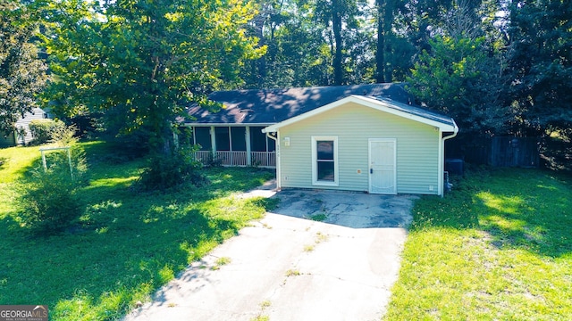 exterior space featuring a front lawn