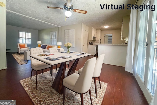 dining area with dark hardwood / wood-style flooring, a textured ceiling, and ceiling fan