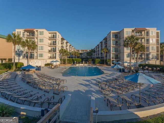 view of pool featuring a patio