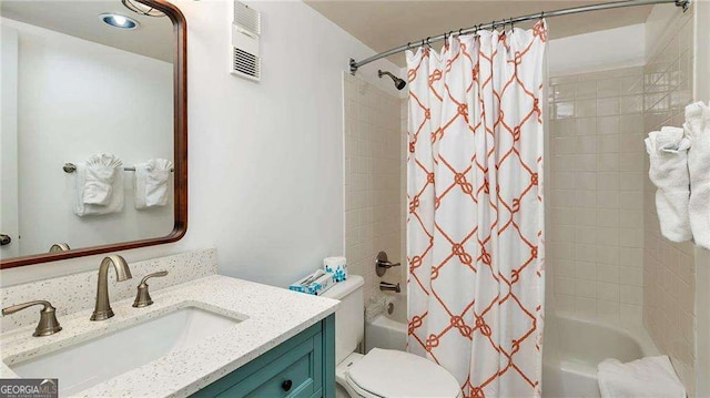 full bathroom featuring shower / bath combination with curtain, toilet, and vanity