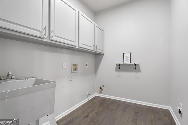 laundry area featuring cabinets, sink, washer hookup, dark hardwood / wood-style floors, and hookup for an electric dryer