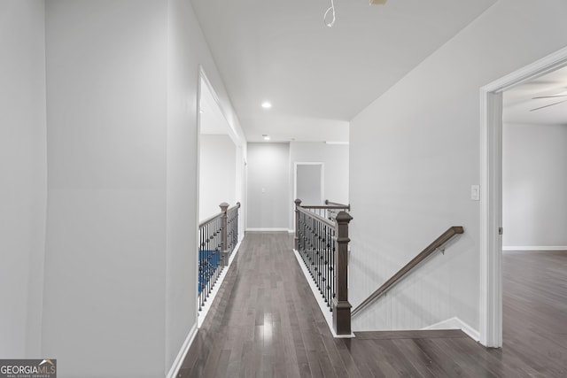 corridor featuring dark hardwood / wood-style flooring