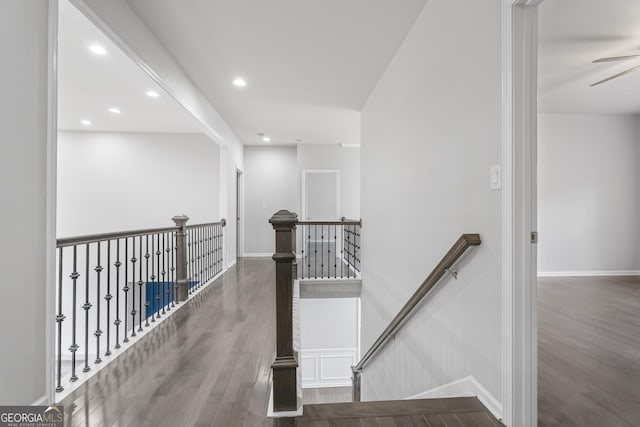 corridor featuring dark hardwood / wood-style flooring