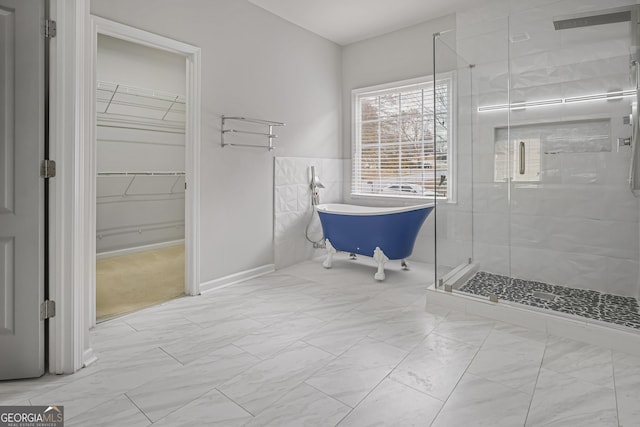 bathroom with shower with separate bathtub