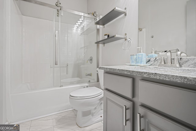 full bathroom with vanity, toilet, and bath / shower combo with glass door