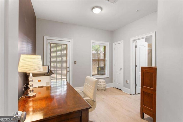 home office featuring light wood-type flooring