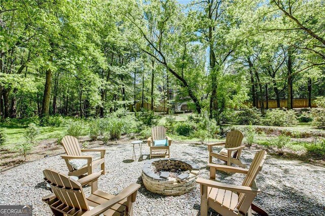 view of patio / terrace featuring a fire pit