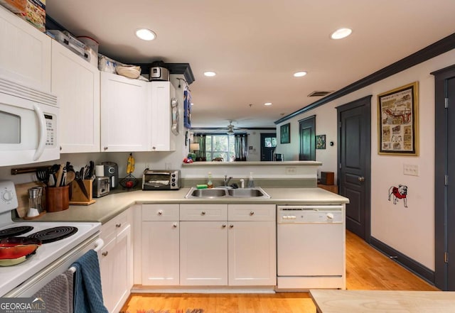 kitchen featuring ceiling fan, white cabinetry, white appliances, and sink