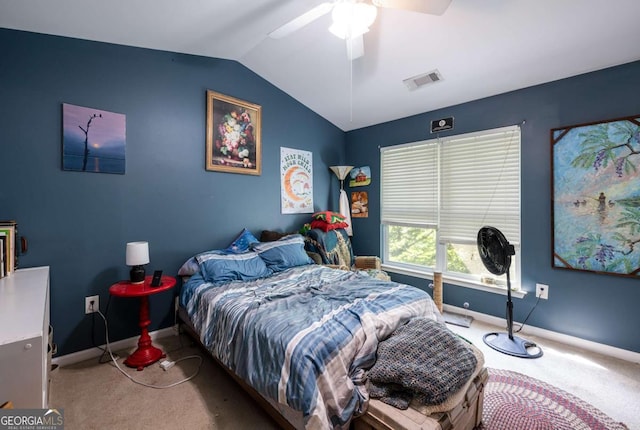 carpeted bedroom with ceiling fan and lofted ceiling