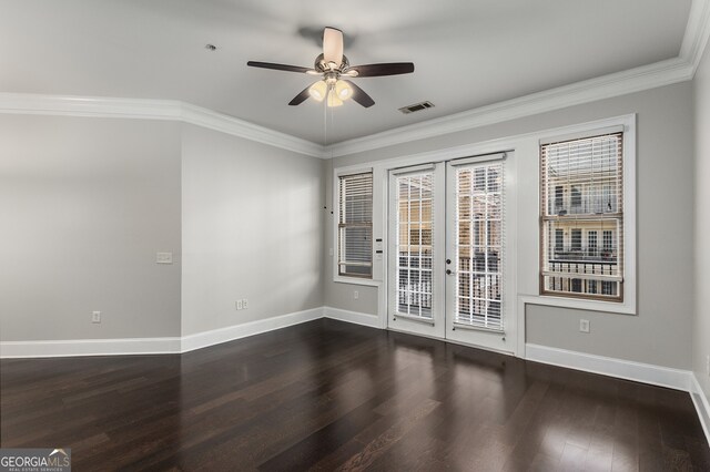 unfurnished room featuring ceiling fan, dark hardwood / wood-style floors, ornamental molding, and french doors