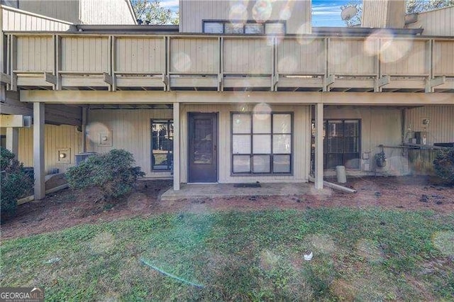 property entrance with a balcony