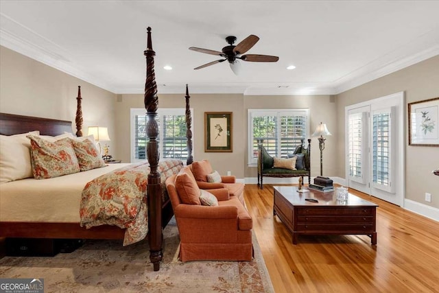 bedroom featuring ceiling fan, light wood-type flooring, ornamental molding, and access to outside