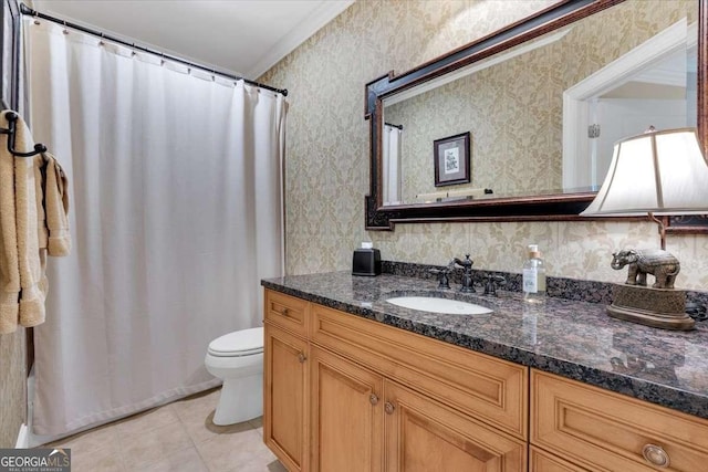 bathroom featuring tile patterned flooring, vanity, ornamental molding, and toilet