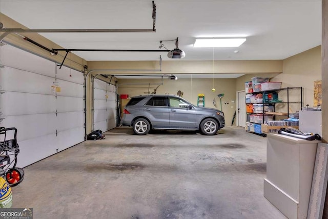 garage featuring a garage door opener