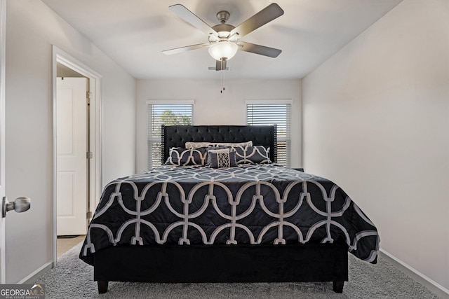 bedroom featuring ceiling fan and carpet floors