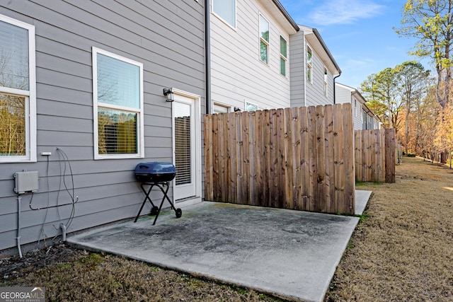 view of patio featuring a grill