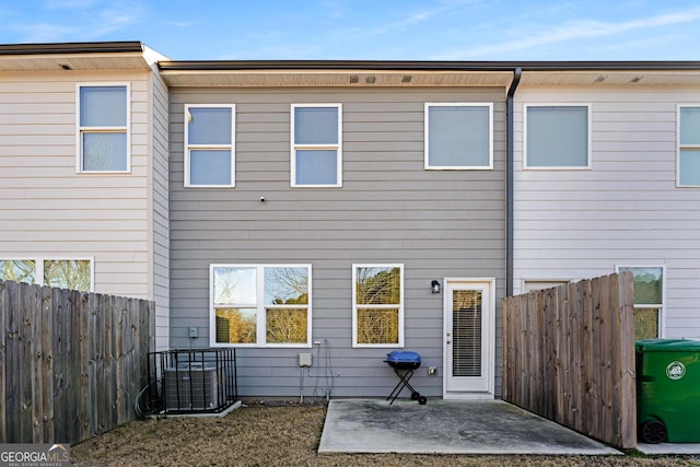 rear view of property with a patio