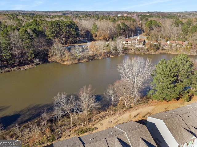 drone / aerial view with a water view