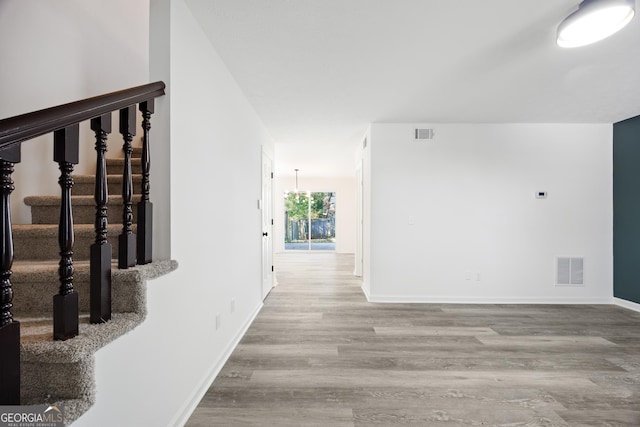 hall featuring light hardwood / wood-style flooring