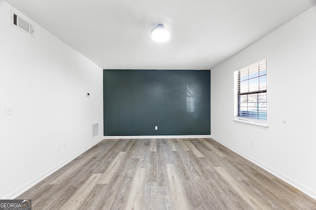 empty room featuring light hardwood / wood-style flooring