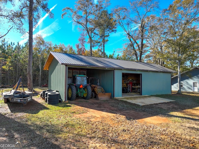 view of outbuilding featuring a garage