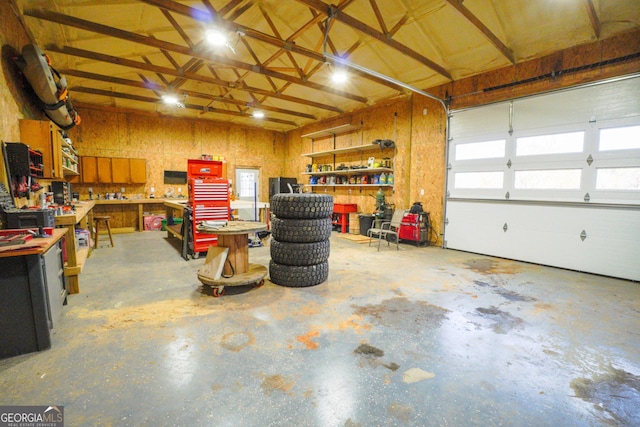 garage with a workshop area