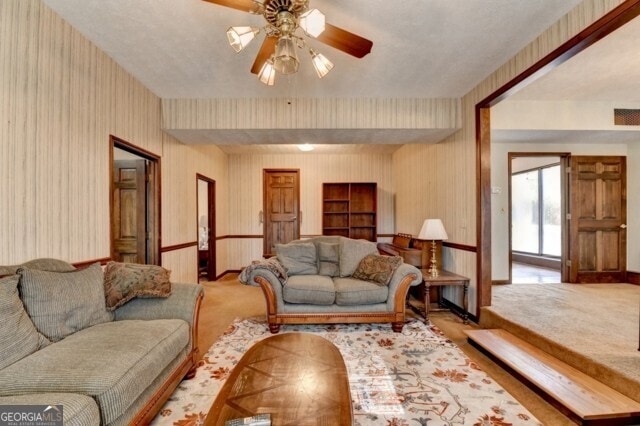 living room with ceiling fan