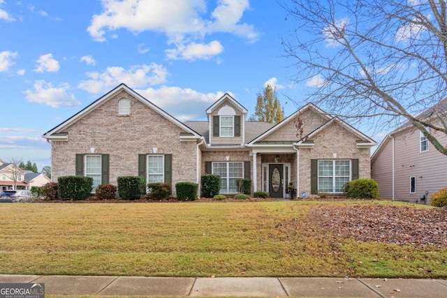 view of front of home featuring a front yard