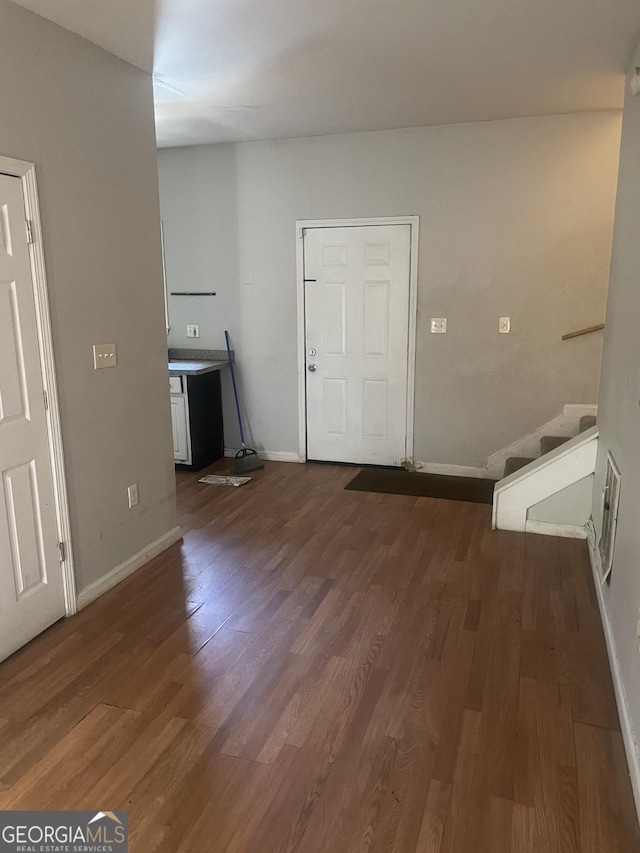 laundry room featuring dark hardwood / wood-style floors