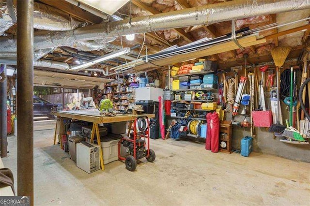 basement with a workshop area